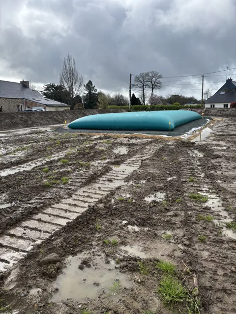 Préparation du terrain pour une citerne souple